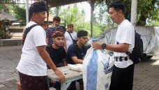 Trash for rice: Bali recycling scheme gives families pandemic lifeline