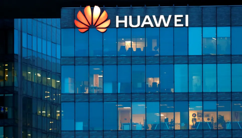 China's Huawei says 2021 revenues down almost 30%