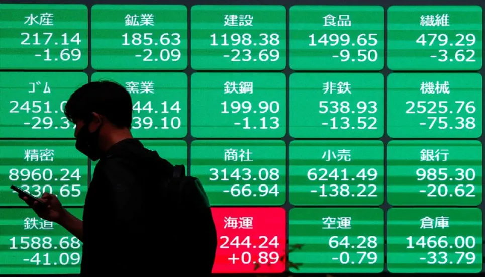 Asia shares track Wall Street higher as investors await earnings