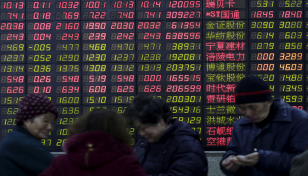 Asian shares lower on US inflation jitters