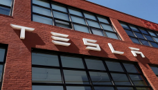 Tesla posts record profits
