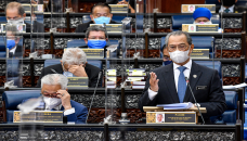 Parliament session in Malaysia suspended over Covid spread risk