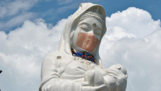 Giant Buddhist goddess in Japan gets face mask to pray for end of Covid