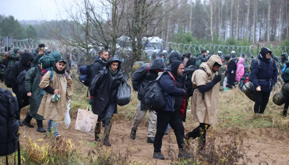 Hundreds of migrants remain at Poland-Belarus border as temperatures drop