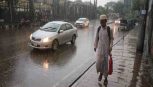 Winter rain takes Dhaka by surprise