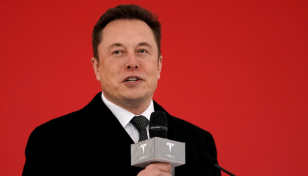 Elon Musk spars with Bernie Sanders, offers to sell more Tesla stock