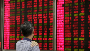 Most Asian markets drop as data points to faster Fed taper