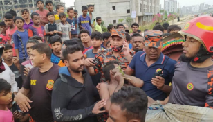 Man rescued alive from Dhaka drain after 6 hrs 