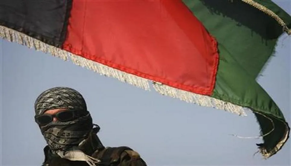 Taliban flag rises over seat of power on fateful anniversary