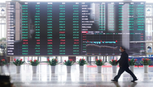 Asian markets stabilise after rout but Evergrande fears linger