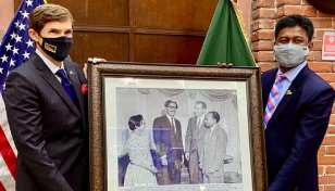 Miller gets Bangabandhu's photos as gift