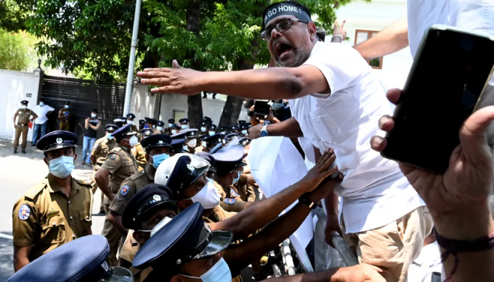 Sri Lanka police fire tear gas to stop protests amid curfew