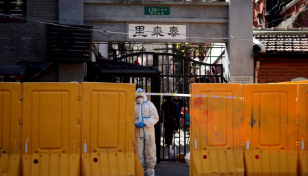 Shanghai lockdown deepens after new surge in asymptomatic Covid cases