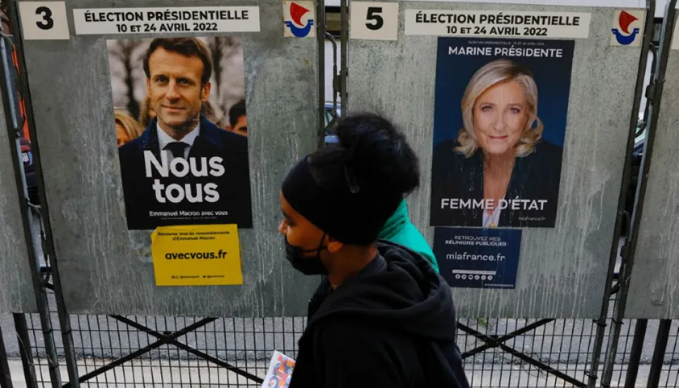 Macron faces a tough fight as France votes on Sunday