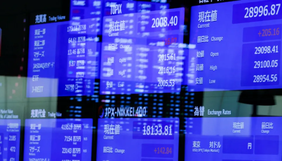 Asian markets rally with Wall St on softer Fed tone