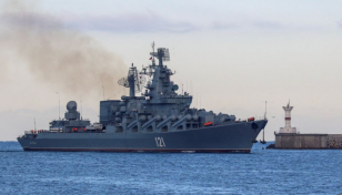 Russia says blast cripples Black Sea flagship, Ukraine claims missile strike