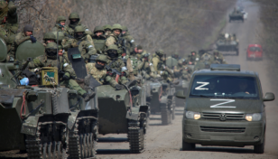 Russia tells Ukrainian troops in Mariupol to lay down arms