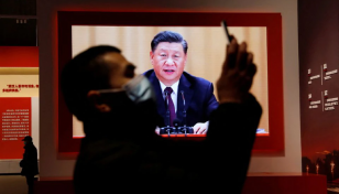 China's Xi sticks with Covid stance despite anger, economic headwinds