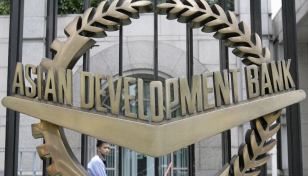 ADB cuts developing Asia growth projection on China slowdown