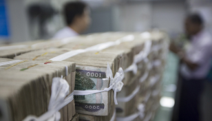 Myanmar relaxes currency conversion order for traders at China, Thailand borders