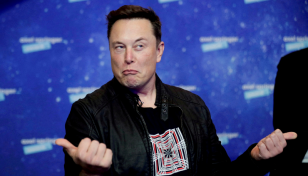 Musk says deal to buy Twitter 'temporarily on hold'