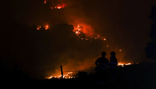 Hundreds of firefighters battle blaze near Lisbon