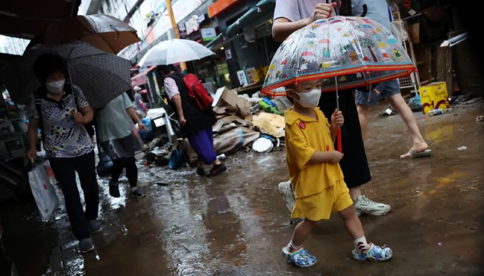 Record rain leaves at least 7 dead in South Korean capital