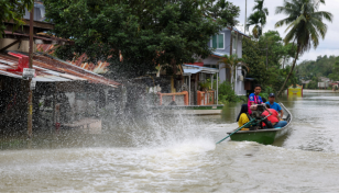 Five dead, over 70,000 evacuated in Malaysia floods