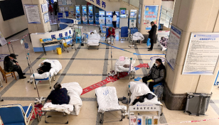 China authorities take over medical supplies production as Covid surges