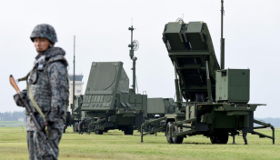 Japan approves budget including record defence spending