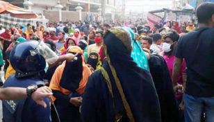 20 injured as RMG workers clash with police in Tongi