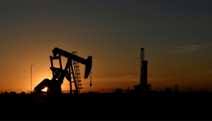 Oil prices gain on improving demand outlook