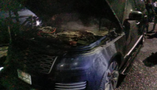 Microbus catches fire at Hatirjheel