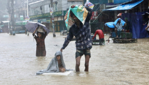 Flood death toll reaches 107 as 5 more die