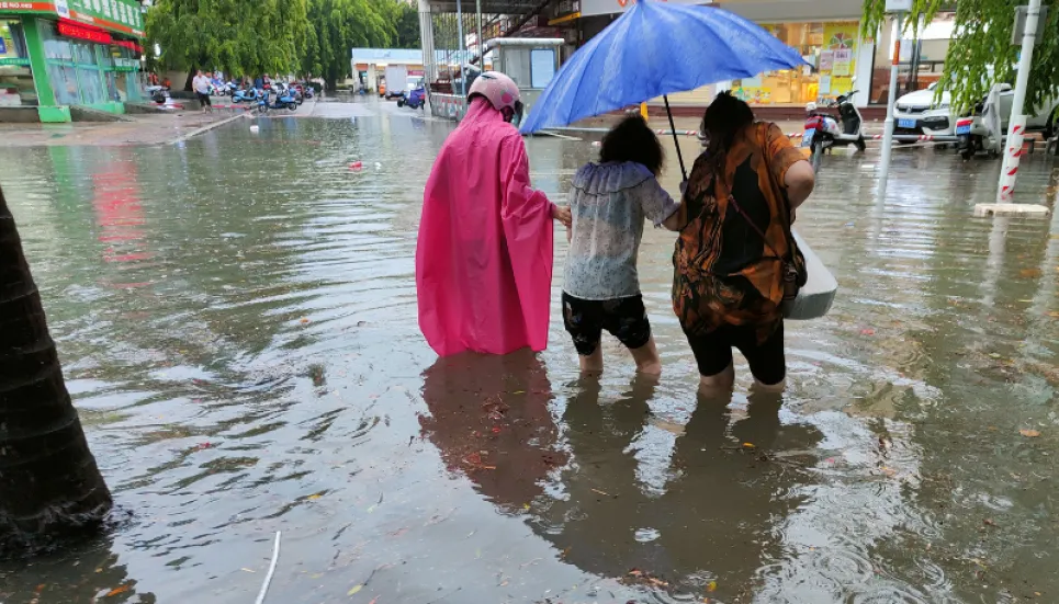 China lashed by year's first typhoon, record rains forecast