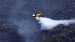 Wildfires rage across Europe as climate alarm sounded