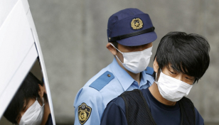 Japan prosecutors indict Abe murder suspect after psych review