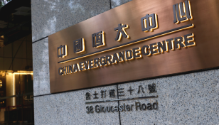 Chinese real estate giant Evergrande ousts top executives