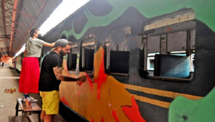 German artist-couple make CU shuttle trains their canvas