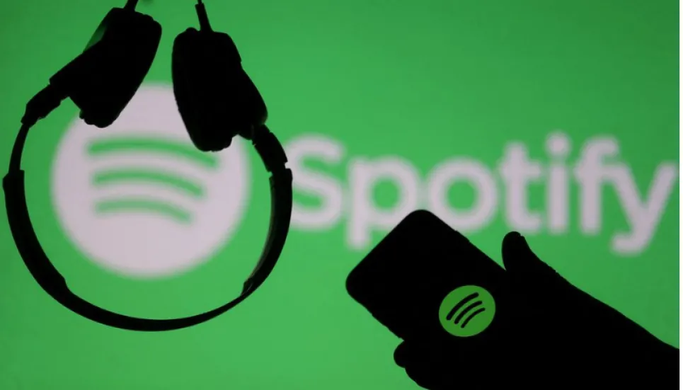 Spotify swings to profit as user numbers grow