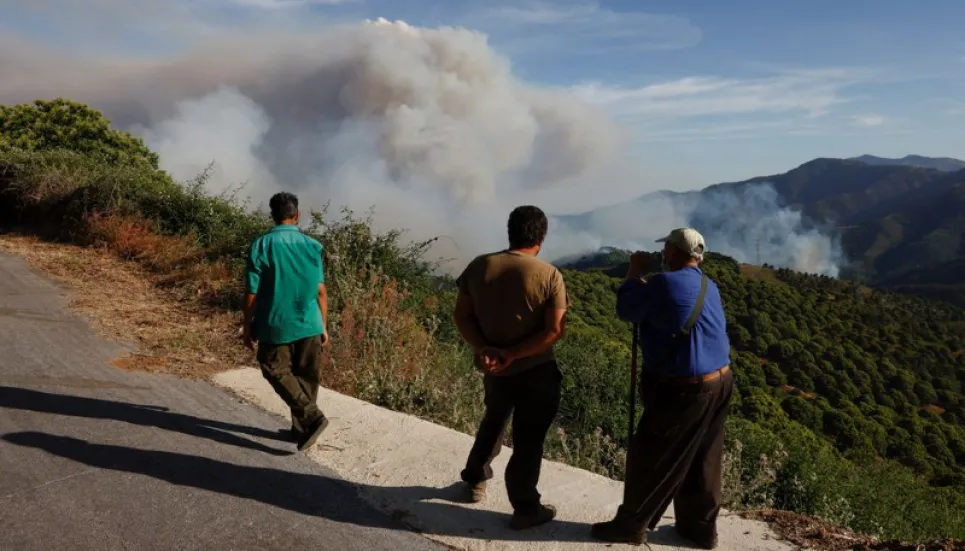 Wildfire in southern Spain forces town evacuation, three hurt