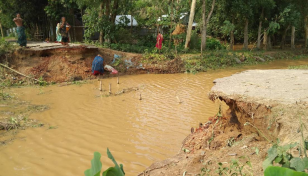 Flash flood submerges fresh areas in Sherpur, child drowns