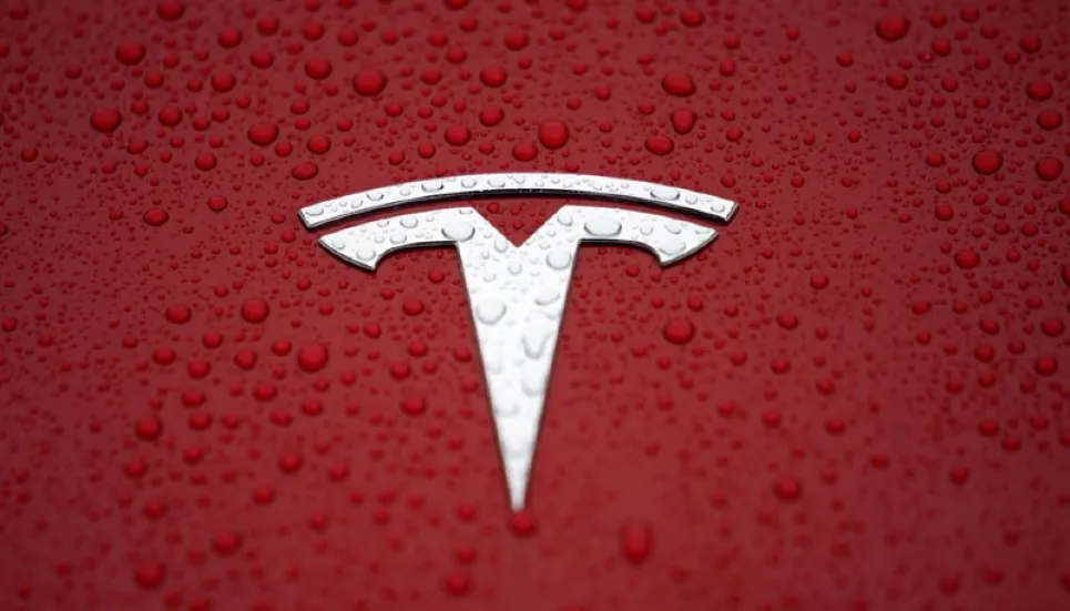 Tesla sued by former employees over 'mass layoff'