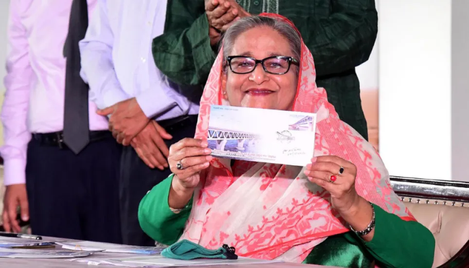 PM releases postage stamps to mark Padma Bridge opening