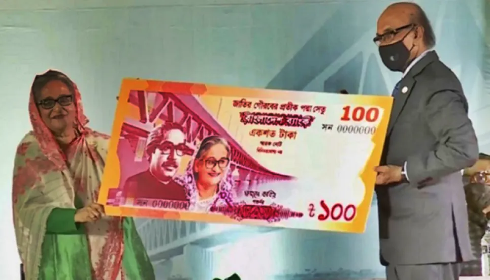 PM unveils commemorative Tk 100 note on Padma Bridge opening