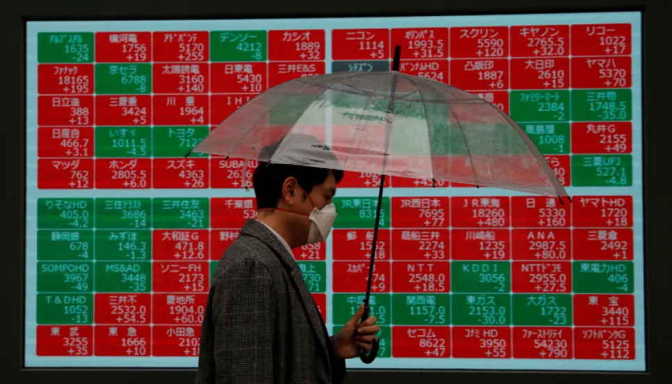 Asian markets drop as inflation spike fans rate fears