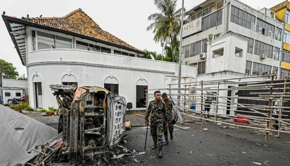 Hundreds defy Sri Lanka curfew after deadly unrest