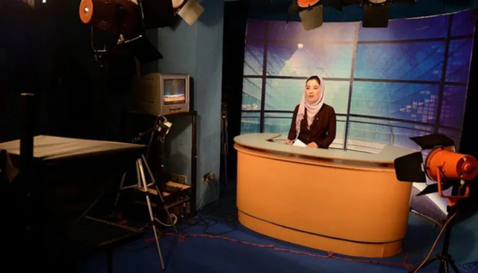 Afghan women TV presenters cover faces on air