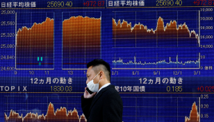 Asian shares stumble on growth worries