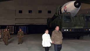 Kim oversees North Korea's ICBM launch with daughter in tow